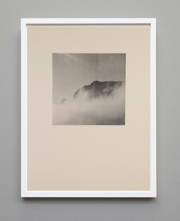 The top of a mountain barely seen through clouds. Silkscreen based on a photo.  