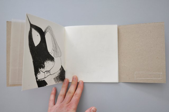 Overview of bookpages with black and white lithographies of a girl and an oversized bird. Photography.