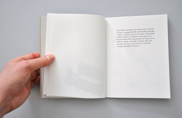 Overview of handmade artists book with short peotic texts. Photography.